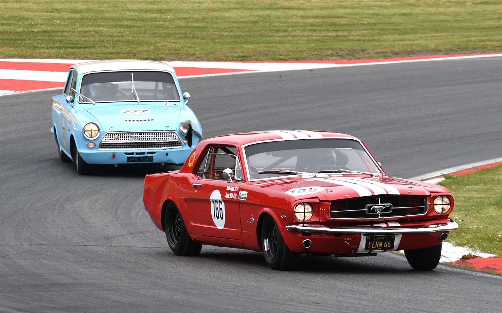 Hill - here racing a 1965 Ford Mustang in May 2019 - has been regularly testing historic cars this year. Picture: Simon Hildrew