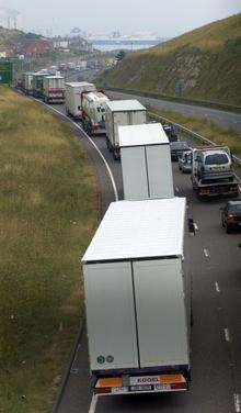 Lorries and cars queue on the approach to the Port of Dover