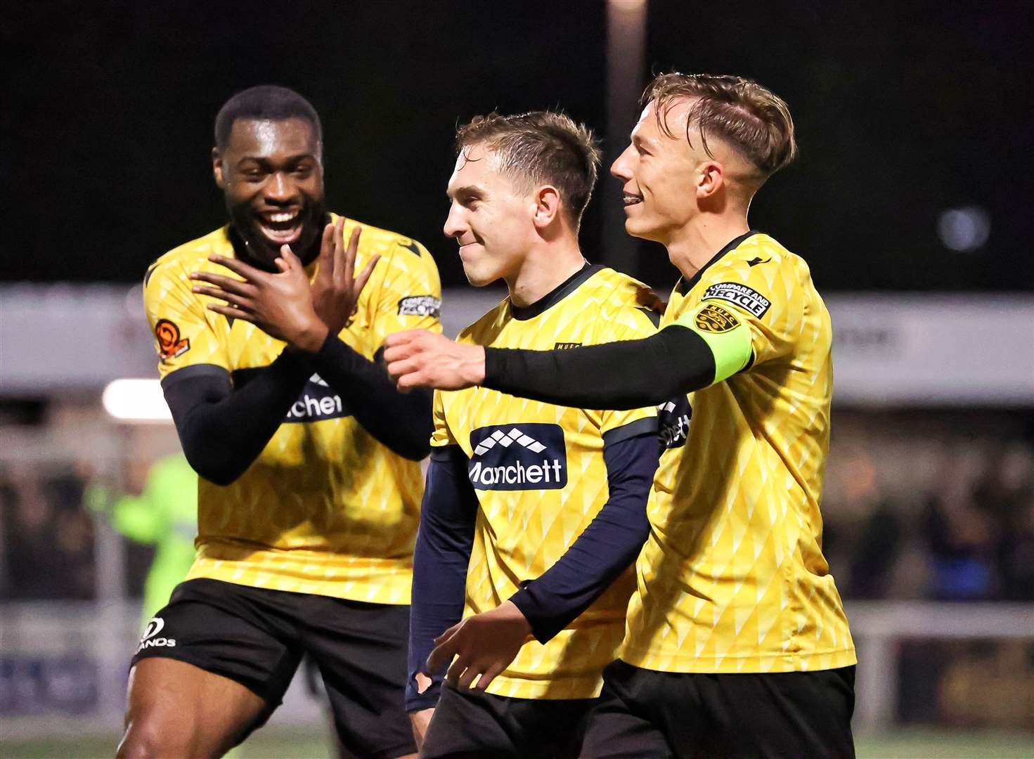 Matt Rush, centre, celebrates his clincher with Paul Appiah and opening goalscorer Sam Corne. Picture: Helen Cooper