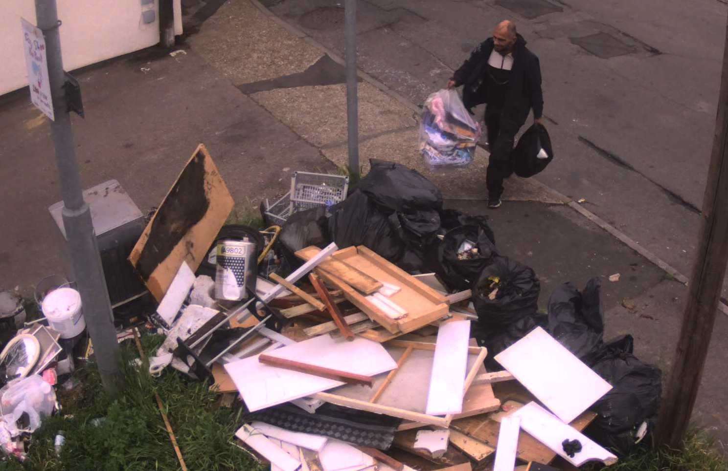 Medway Council want to identify this man believed to be involved in disposing of waste in Bank Street, Chatham. Picture: Medway Council