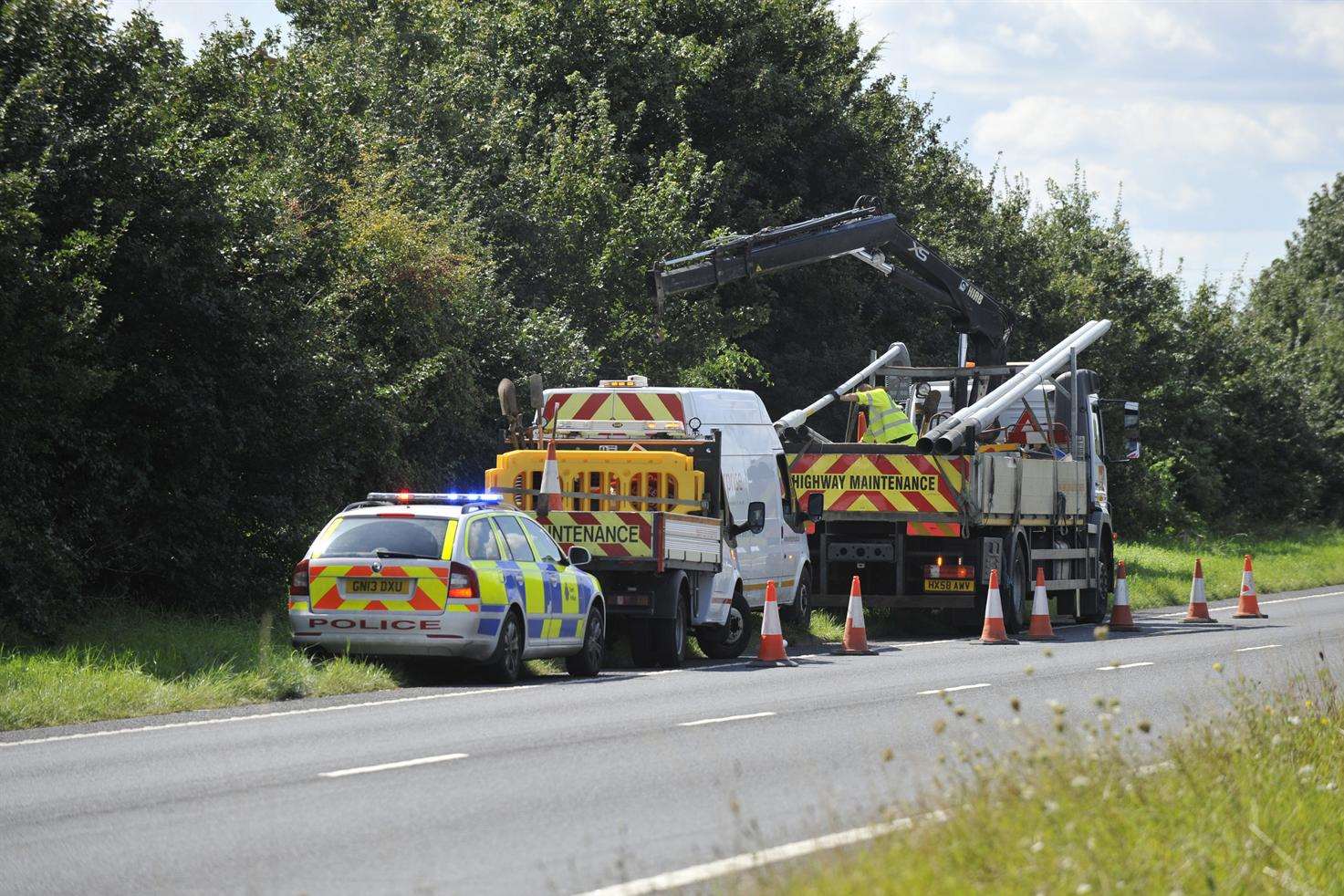 Police and KCC Highways team inspecting the damage