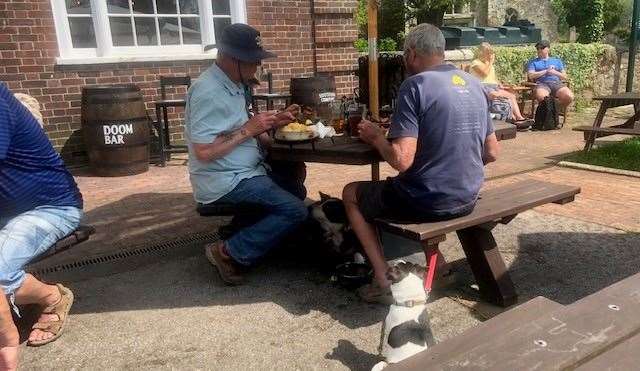 Every table at the front of the pub seemed to have at least one, if not more, dogs tethered to them