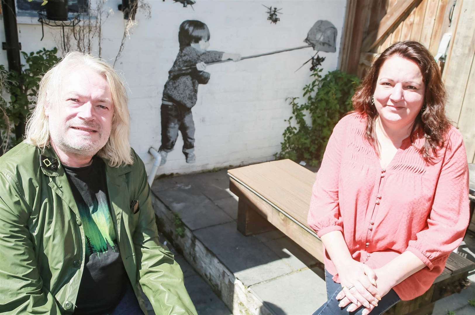 Managers Karen and Jared with the existing Catman piece. Pic: Star Pubs & Bars