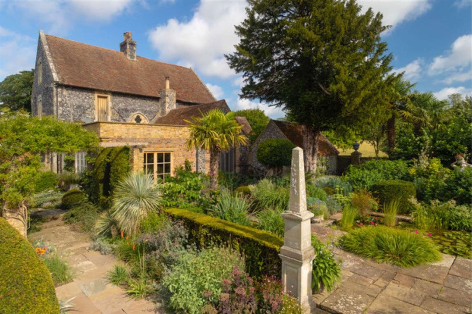 The main house is surrounded by gardens