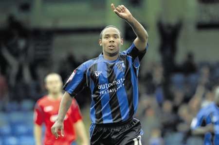 Chris Palmer celebrates scoring his penalty against Shrewsbury