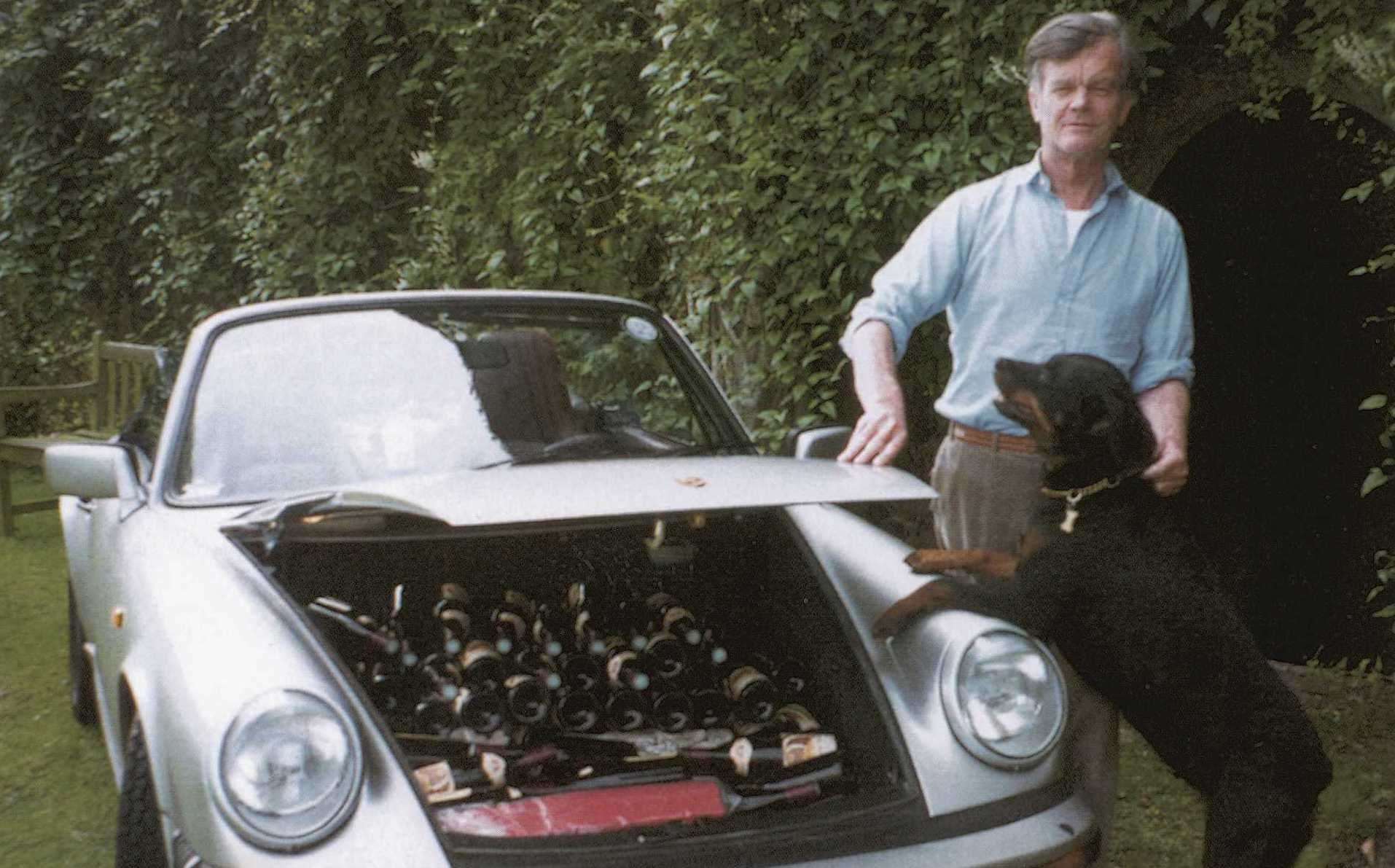 Alan Clark at Saltwood with his Porsche 911 full of wine - his collection was auctioned off following his death