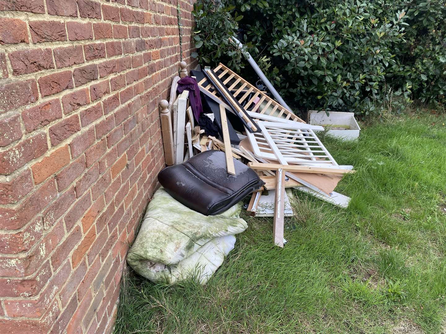 A pile of rubbish in the garden has reportedly been left untouched for some time and is attracting rats