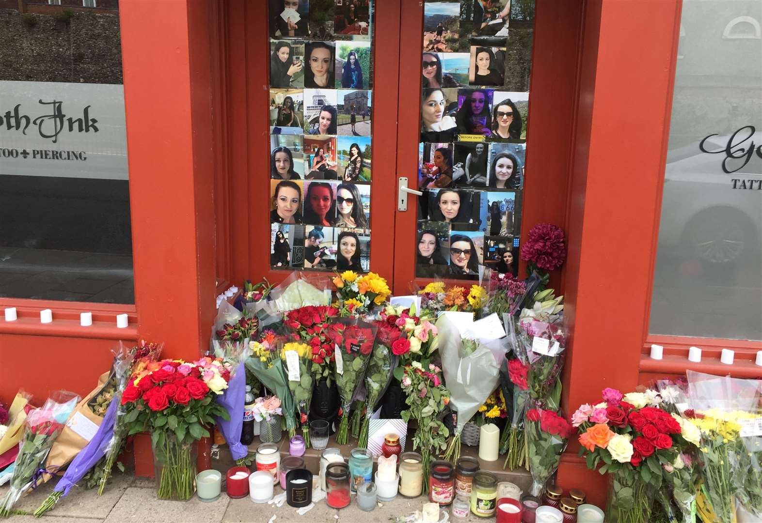 Tributes to Ramona Stoia, 35, outside the GothInk tattoo parlour in Canterbury