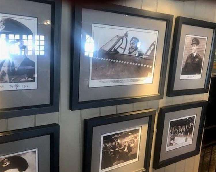 Photographs of frequented pilots at the eatery in Brasted. Picture: The White Hart