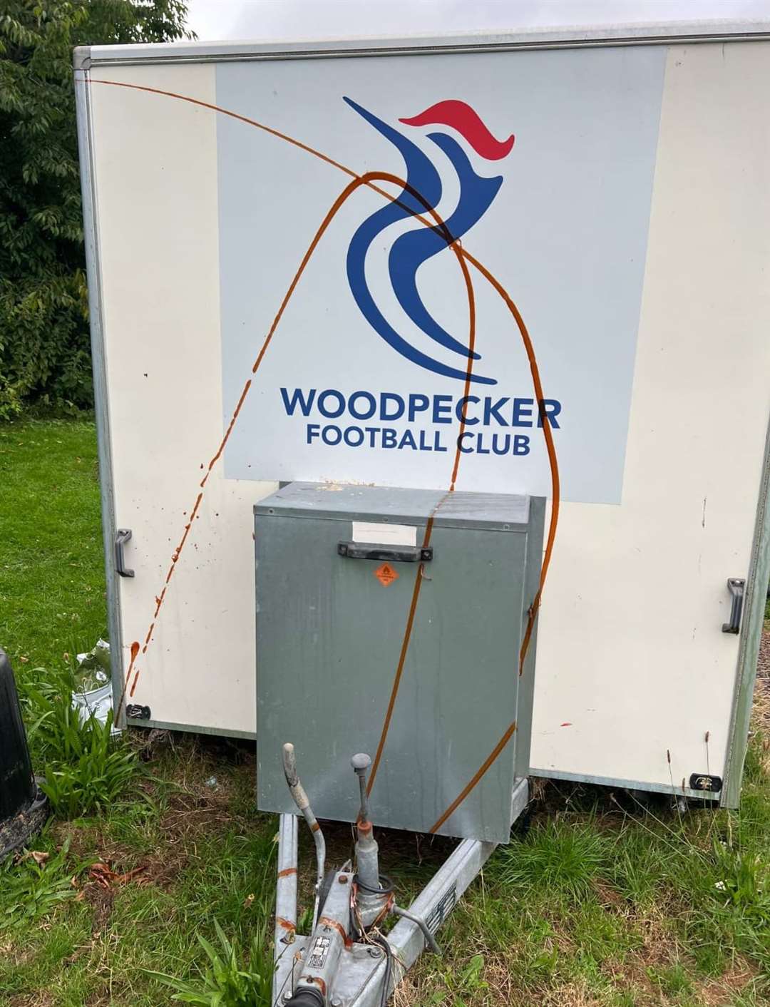 Woodpecker FC's snack wagon was covered in sauce inside and out