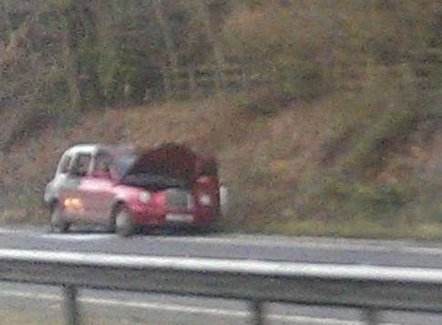 This taxi caught alight on the A21