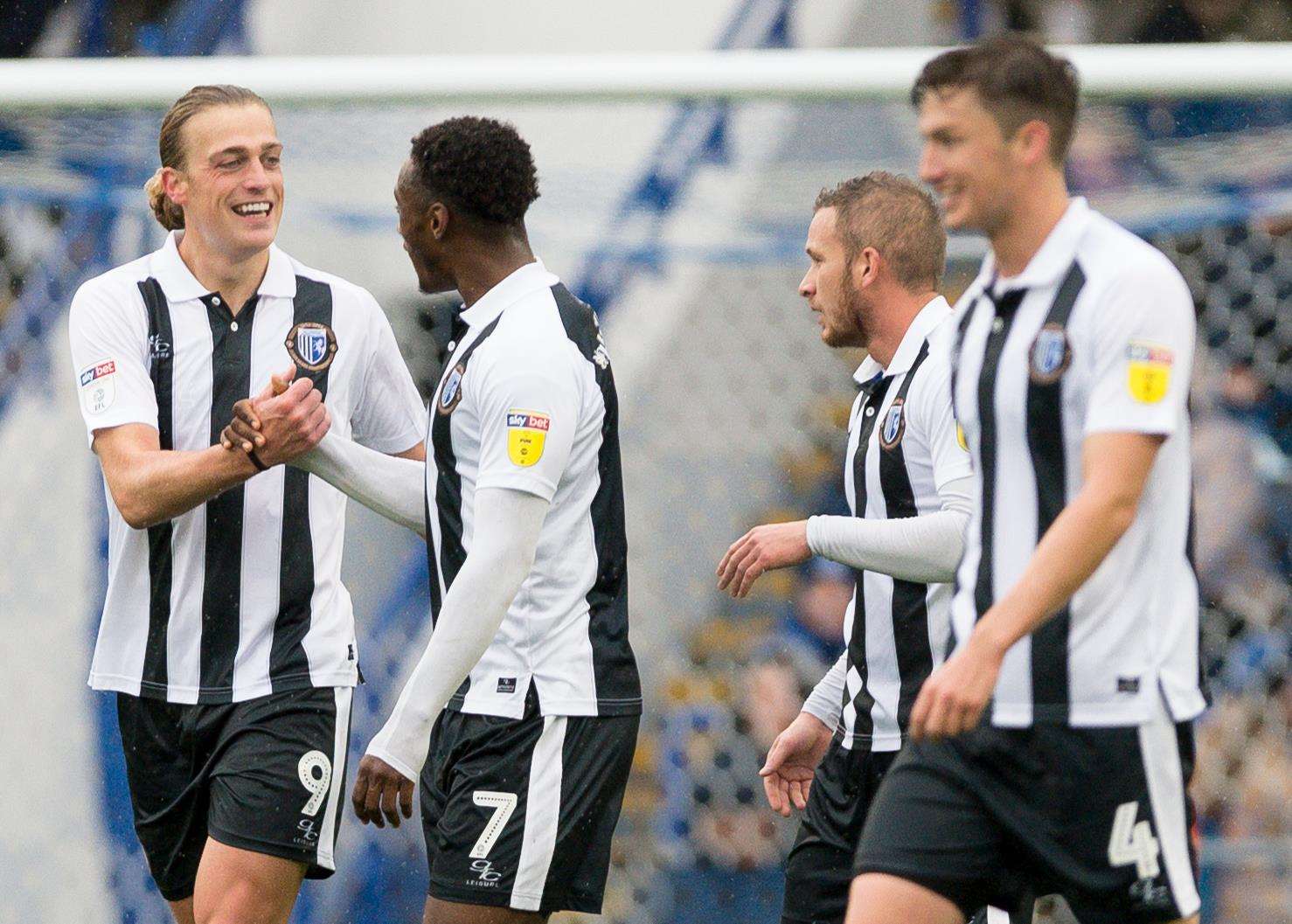 Tom Eaves is congratulated by Brandon Hanlan after his opener Picture: Ady Kerry