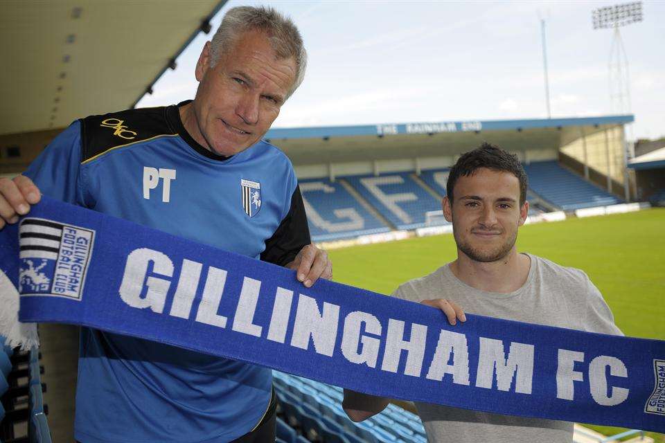 New signing Josh Pritchard with Gills boss Peter Taylor. Picture: Barry Goodwin