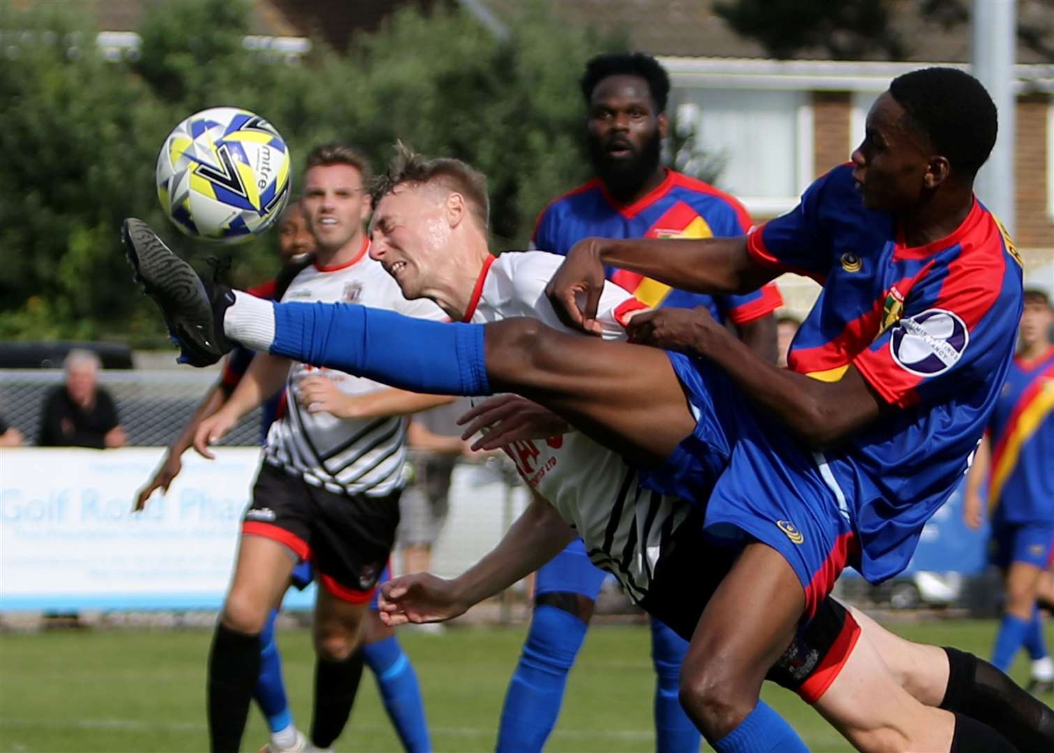 Deal's Ben Chapman just fails to connect with a deep cross as he is challenged by Holmesdale player Donald Macauley. Picture: Paul Willmott