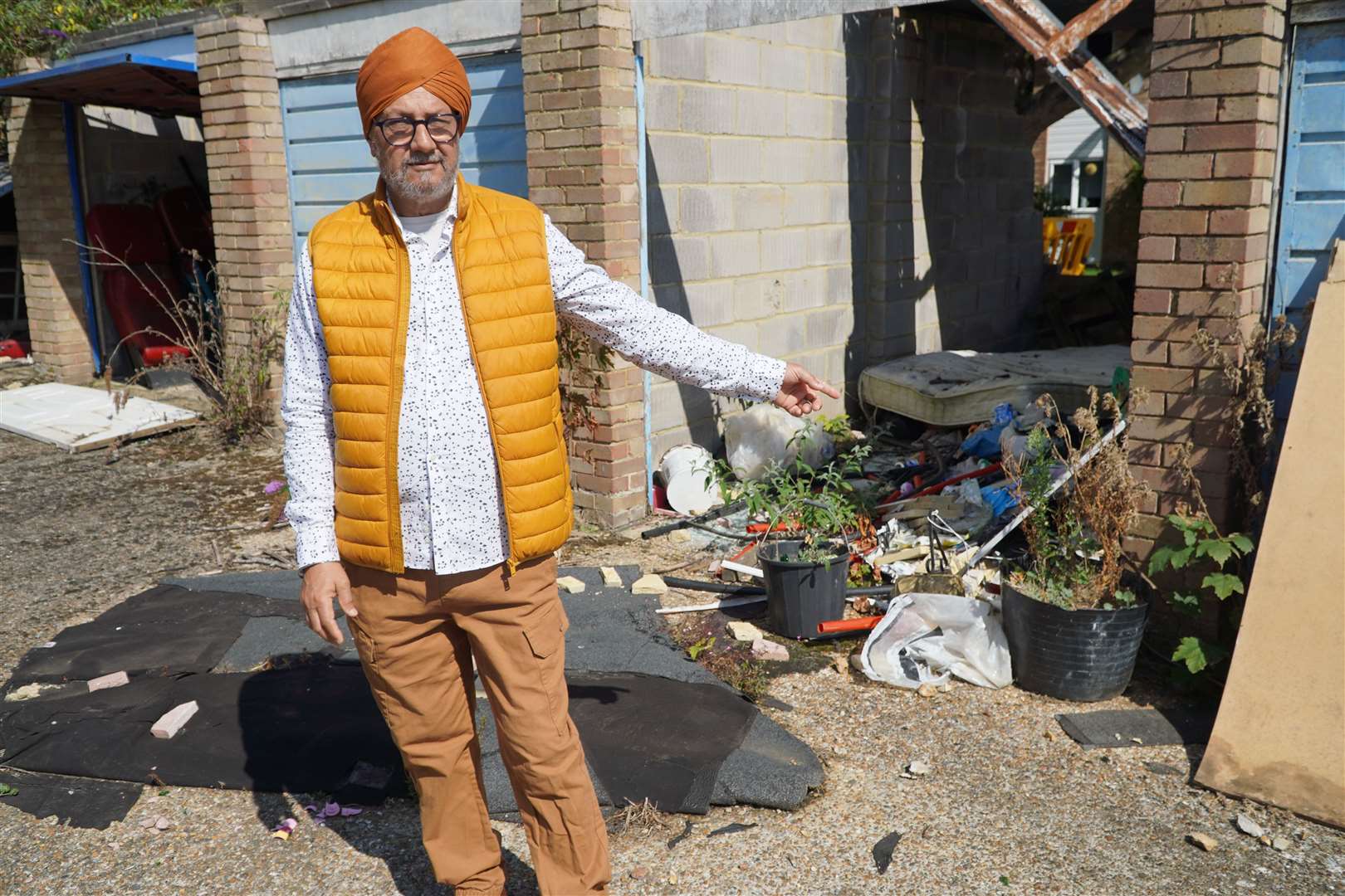 Paul Babra, 69, says the state of garages in Kemsing Gardens, Hales Place, makes him want to move out of his home of 30 years