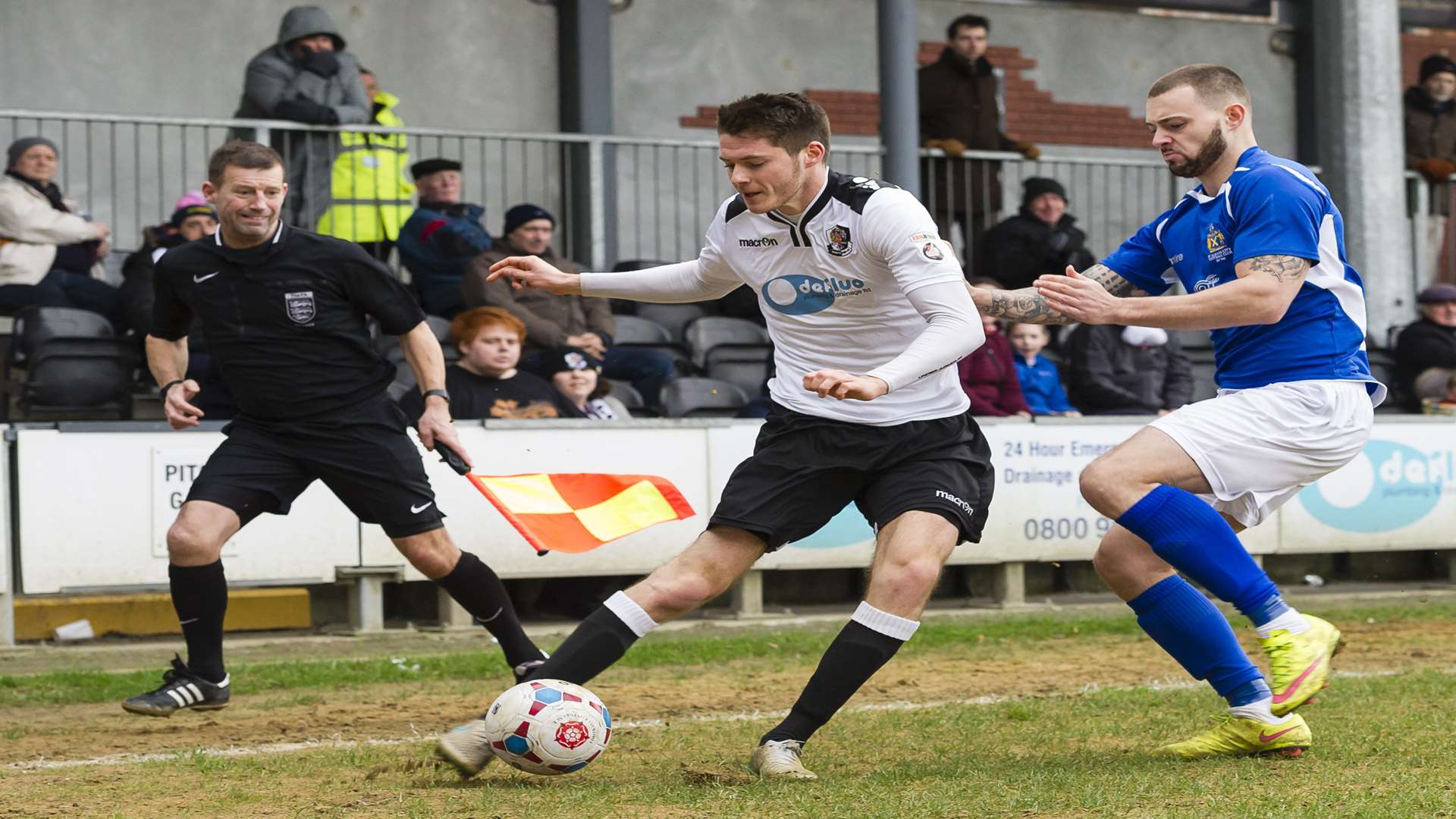 Full-back Tom Gardiner hooks in a cross from near the corner flag Picture: Andy Payton