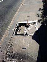 The damaged manhole covers in Minster Road, Minster