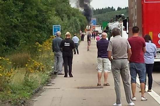 People have been getting out of their cars to see the lorry fire on the M20. Picture: @emsalmon