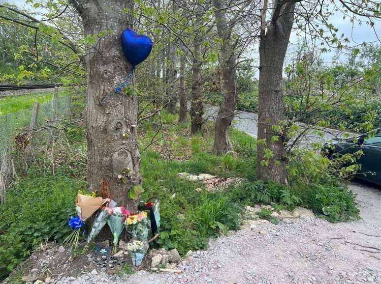 Balloons and flowers in Lower Road, Teynham, in tribute to the Sittingbourne teenager. Picture: Megan Carr