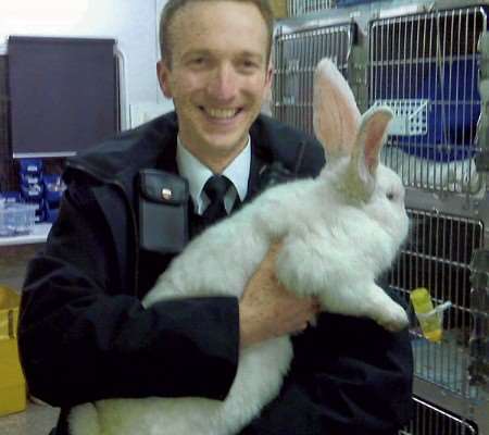 'Tiny' safely in the arms of PC Matt Jackson.