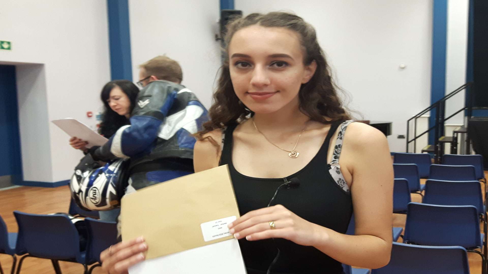 Taqiyah Melflah picks up her results at St Augustine Academy