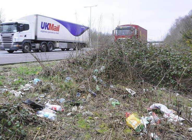 Litter strewn across the roadside along the A2