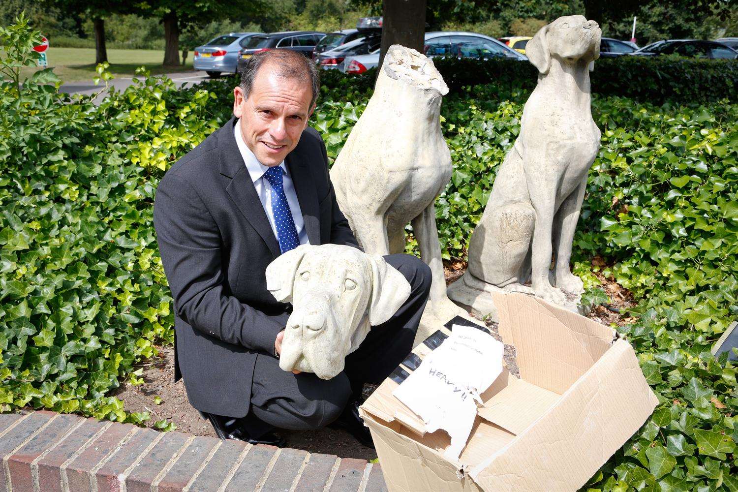 Dominic Di Cara with the head and the statues