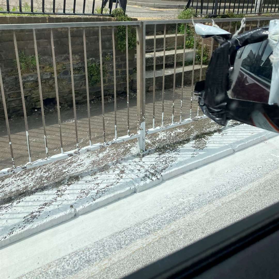 The railings and the pavement are covered near Cherry Tree Avenue. Picture: Angel Adams