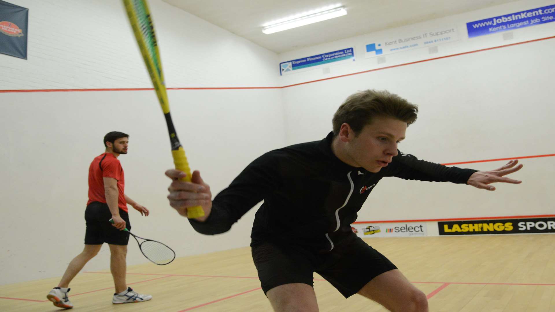 Charles Sharpes, in black, beat George Parker to lift the men's title on Sunday Picture: Gary Browne