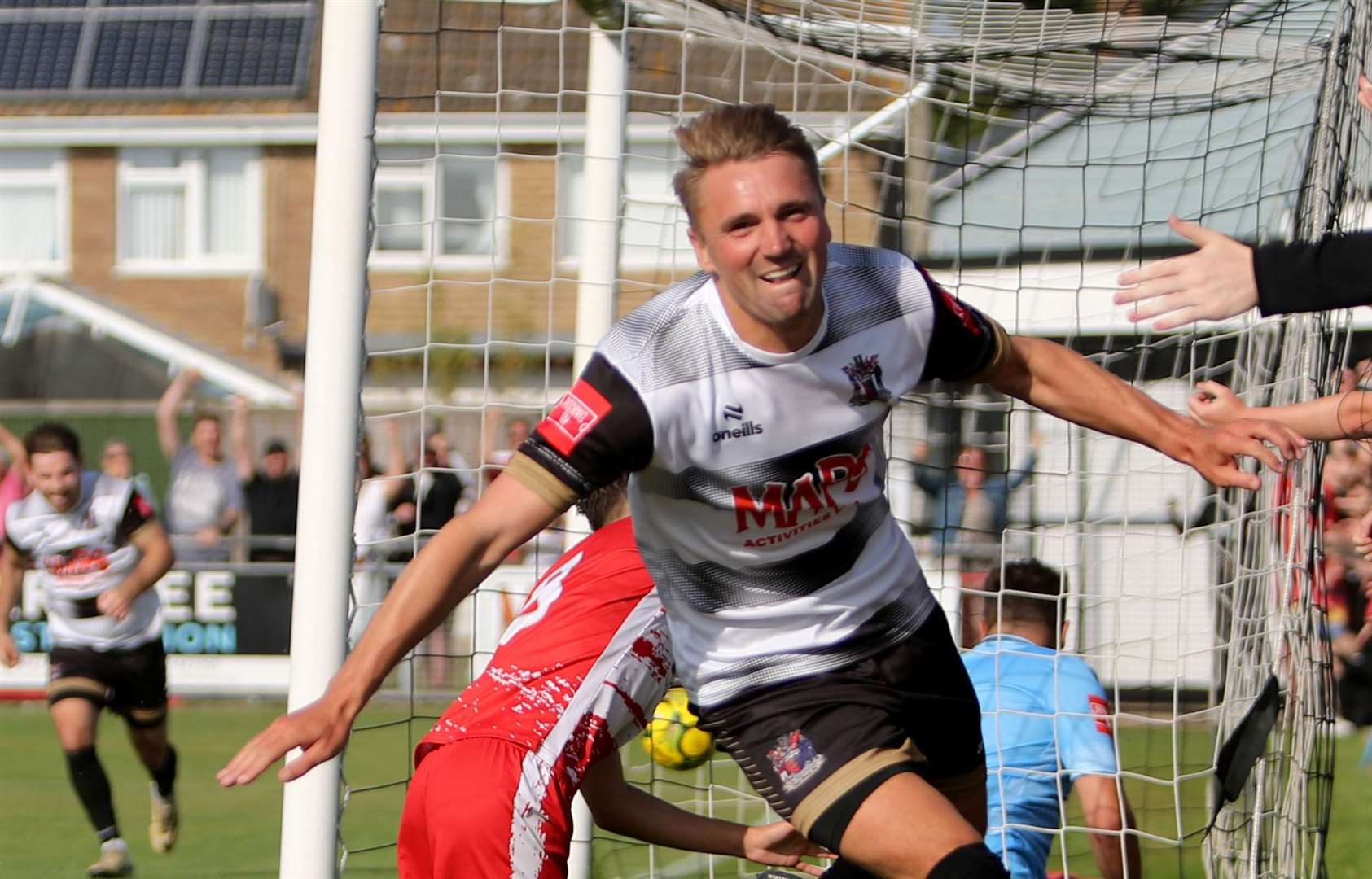 Deal's Tom Chapman celebrates his goal during the second half of their Isthmian South East 4-2 derby home defeat to Ramsgate on Bank Holiday Monday. Picture: Paul Willmott