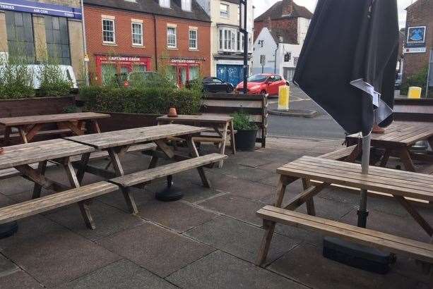 The outside seating area at the side of the pub