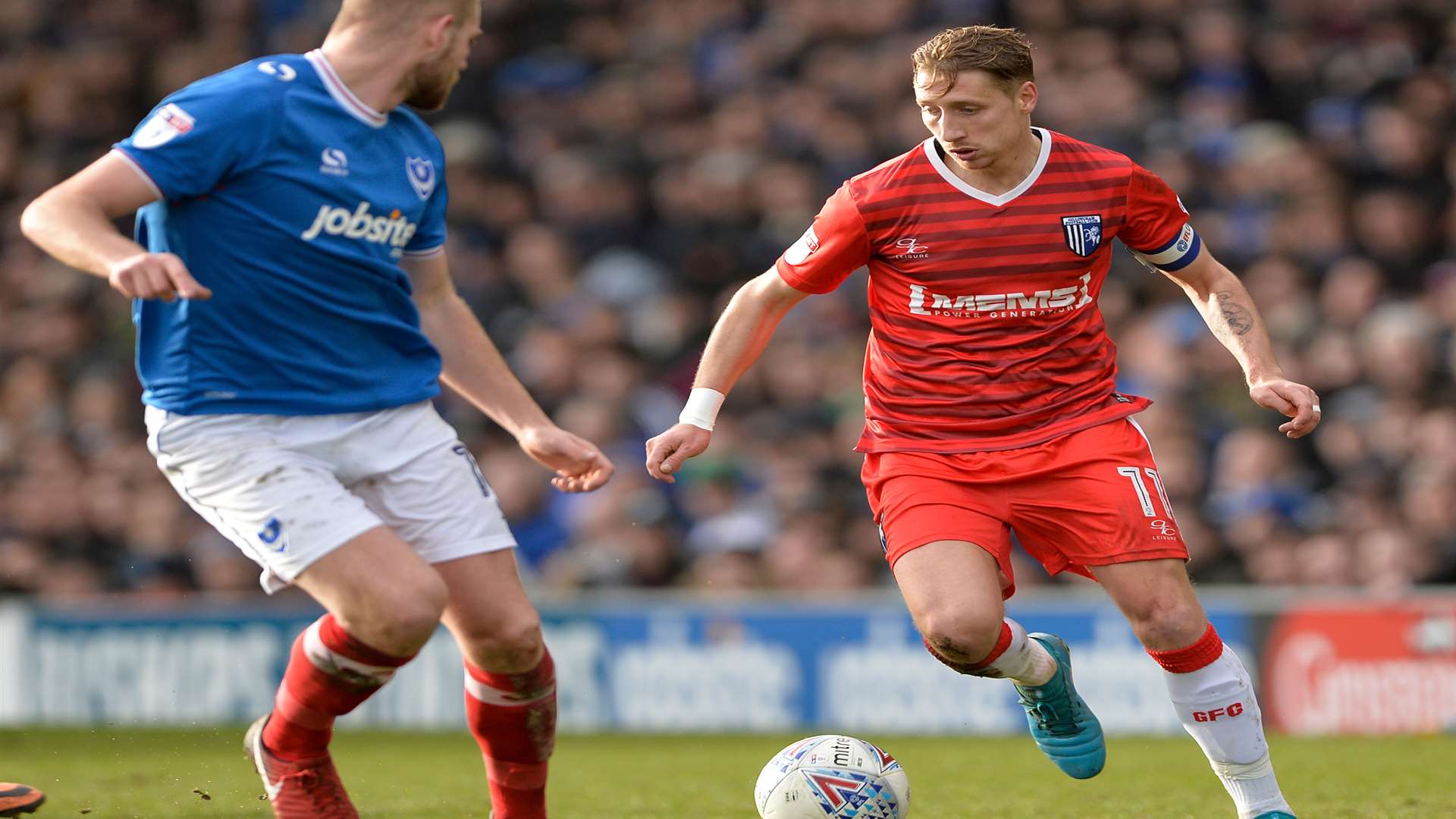 Skipper Lee Martin takes on Jack Whatmough Picture: Ady Kerry