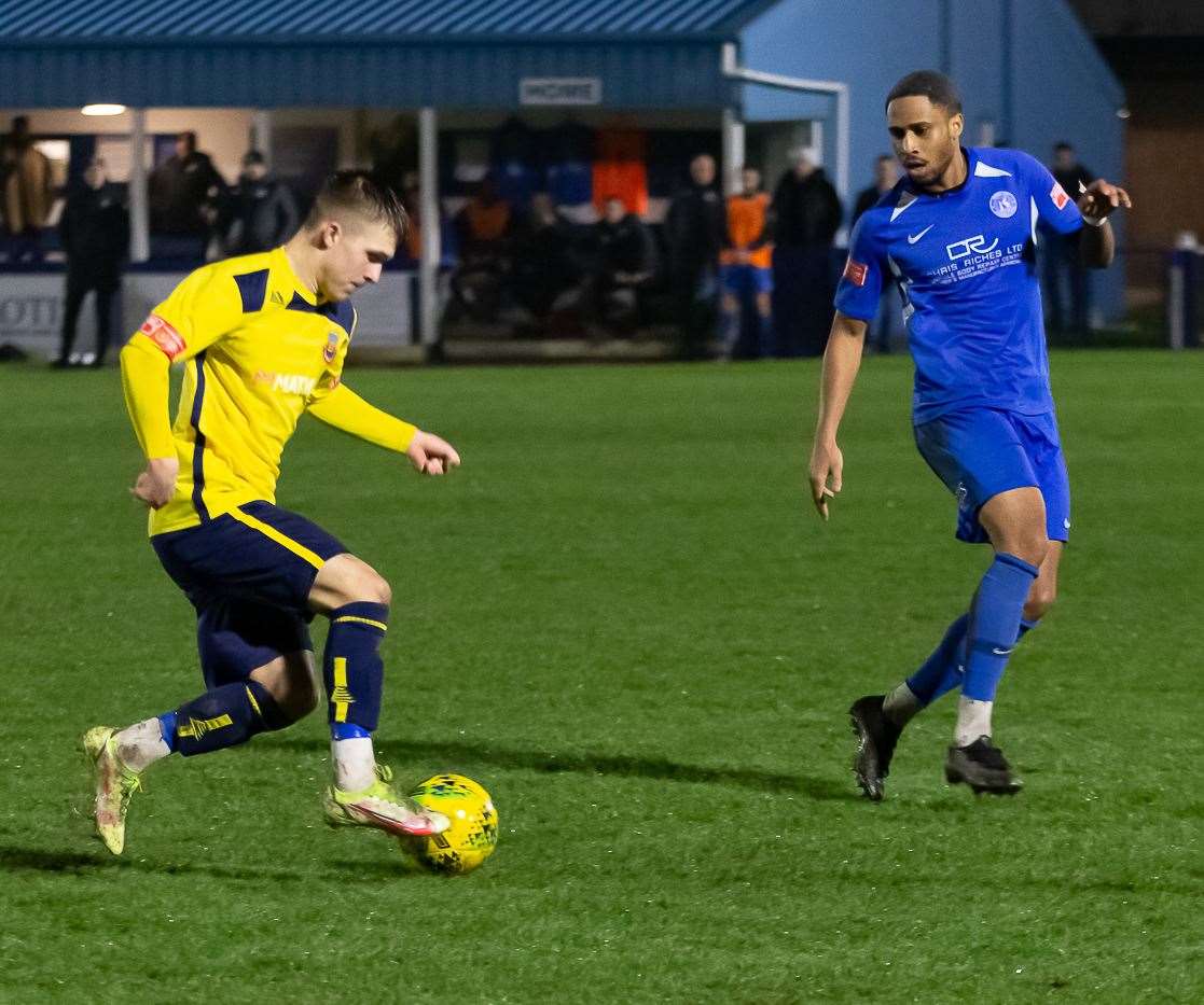 Action from Whitstable's 2-1 Velocity Trophy victory at Herne Bay last Tuesday - but the Oystermen have since been kicked out the competition for fielding an ineligible player. Picture: Les Biggs