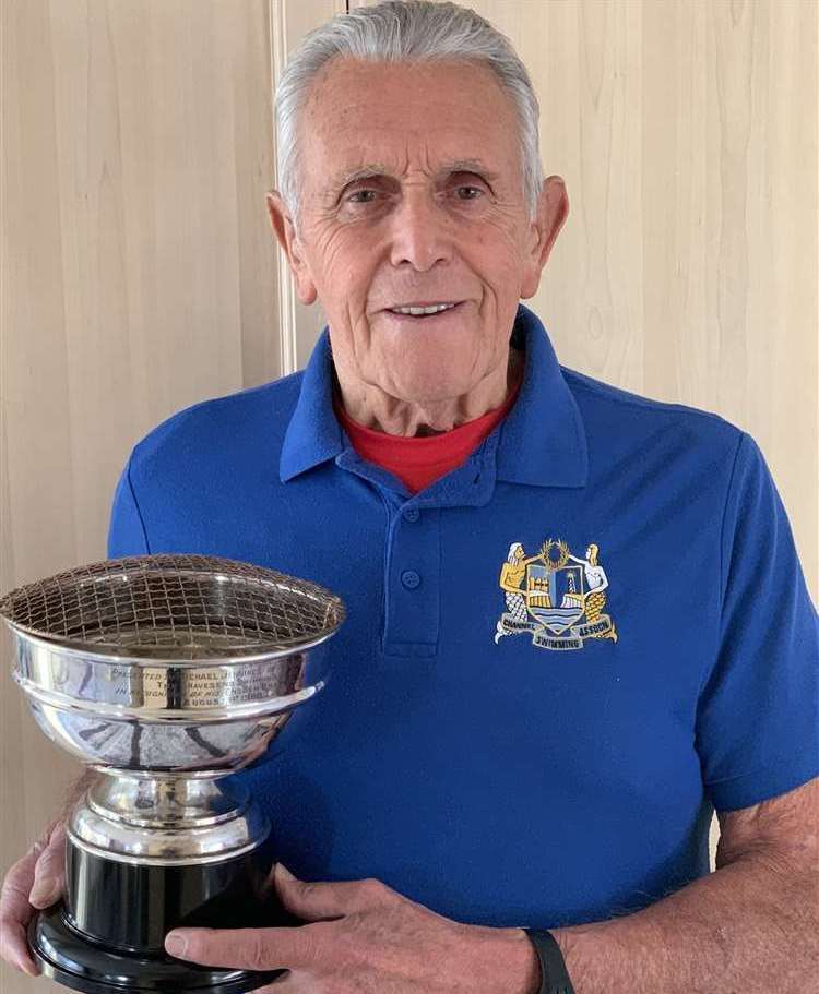 Michael pictured with the trophy back at his home in Gravesend. Picture: Michael Jennings