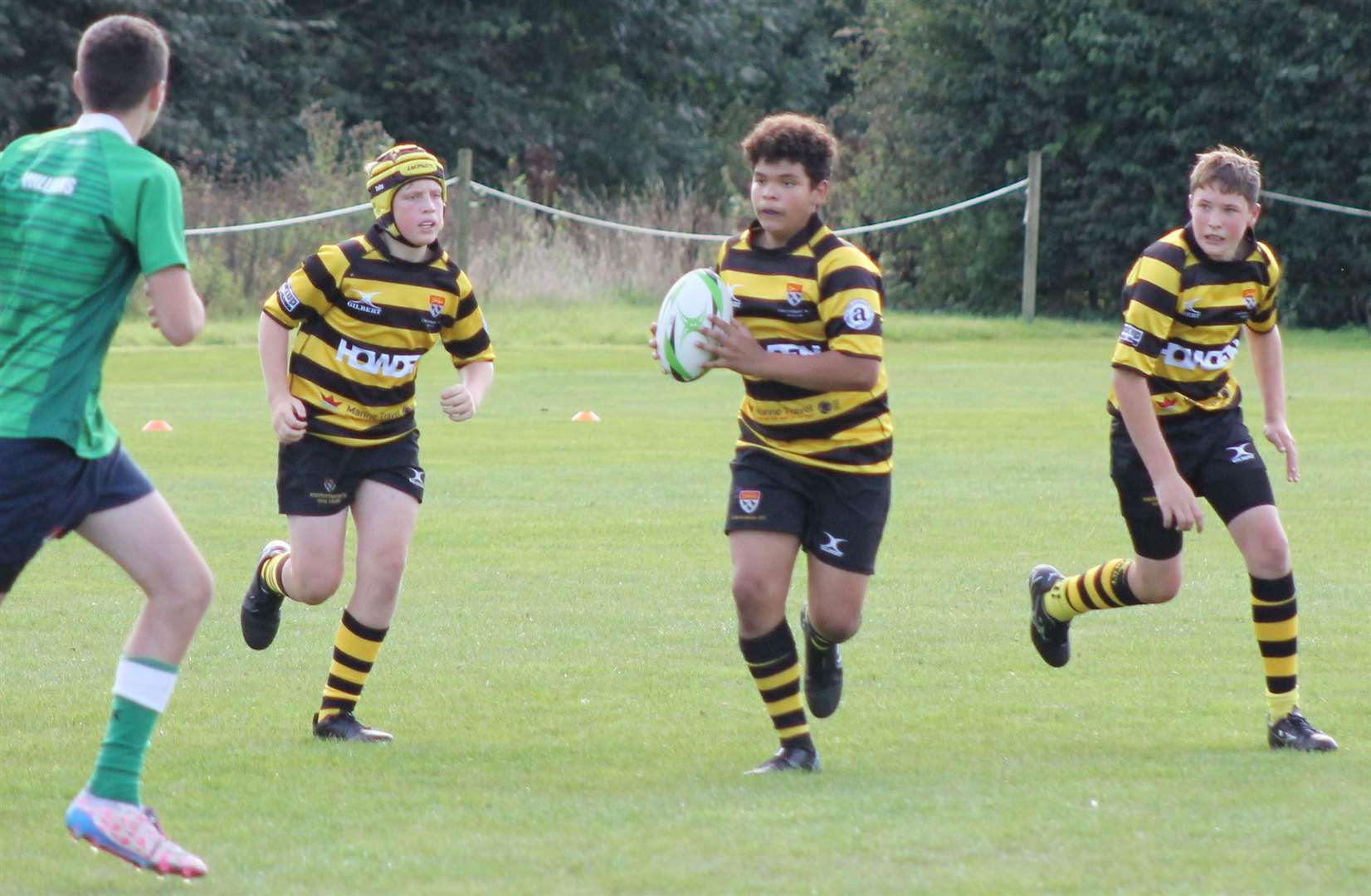 One of Canterbury Rugby Club's under-13s in action against London Irish