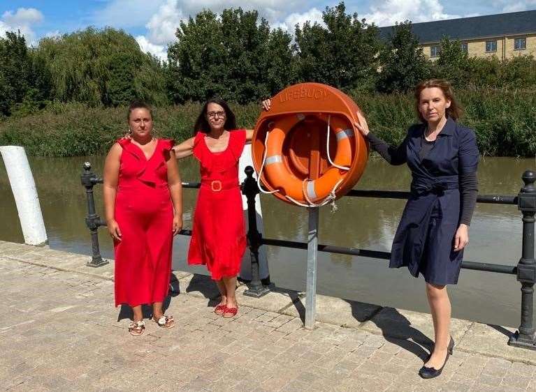 Lucas Dobson's mum Kirsty Furze and grandmother Donna Kentfield with MP Natalie Elphicke at the riverside in Sandwich