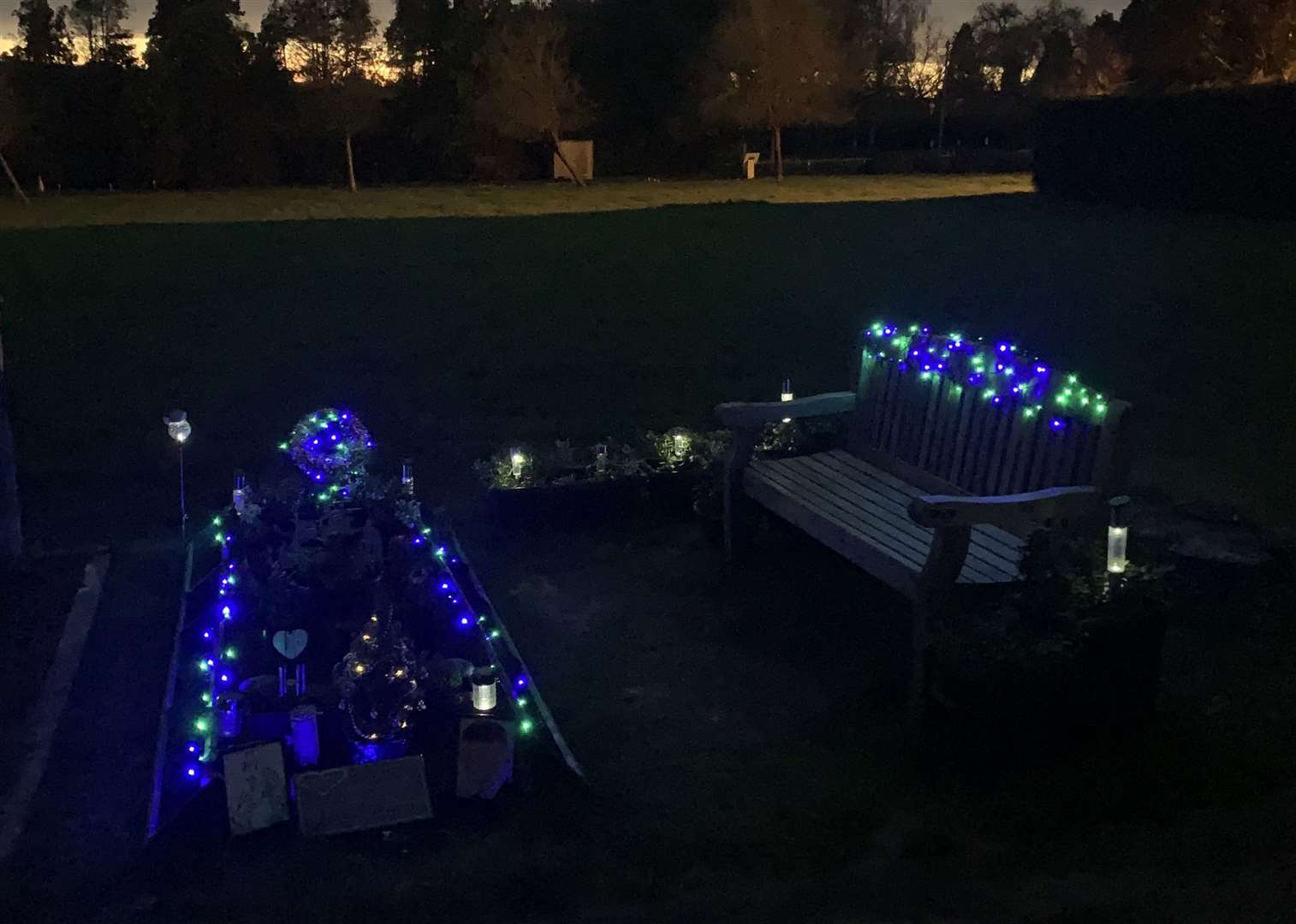 Festive lights illuminate Matthew's grave. Picture: Michael Bond