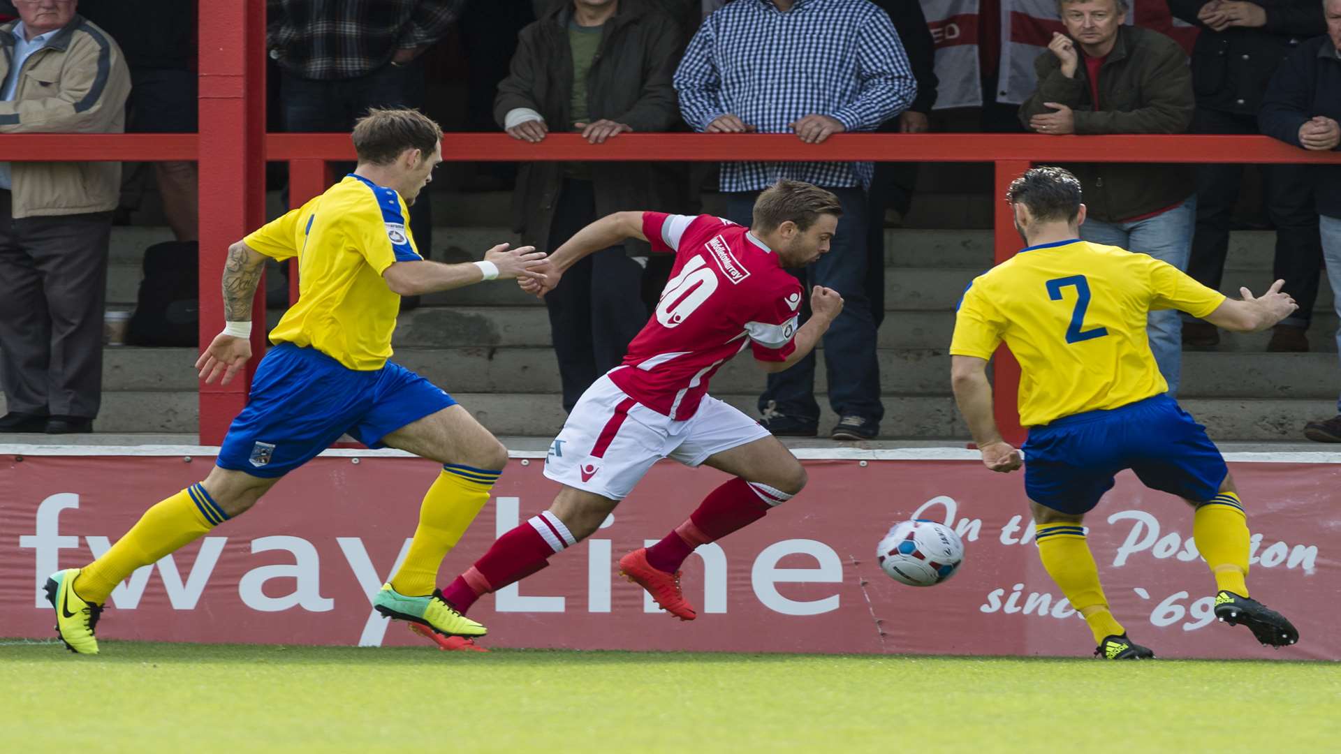 Two-goal Matt Godden takes on two Maidenhead players Picture: Andy Payton