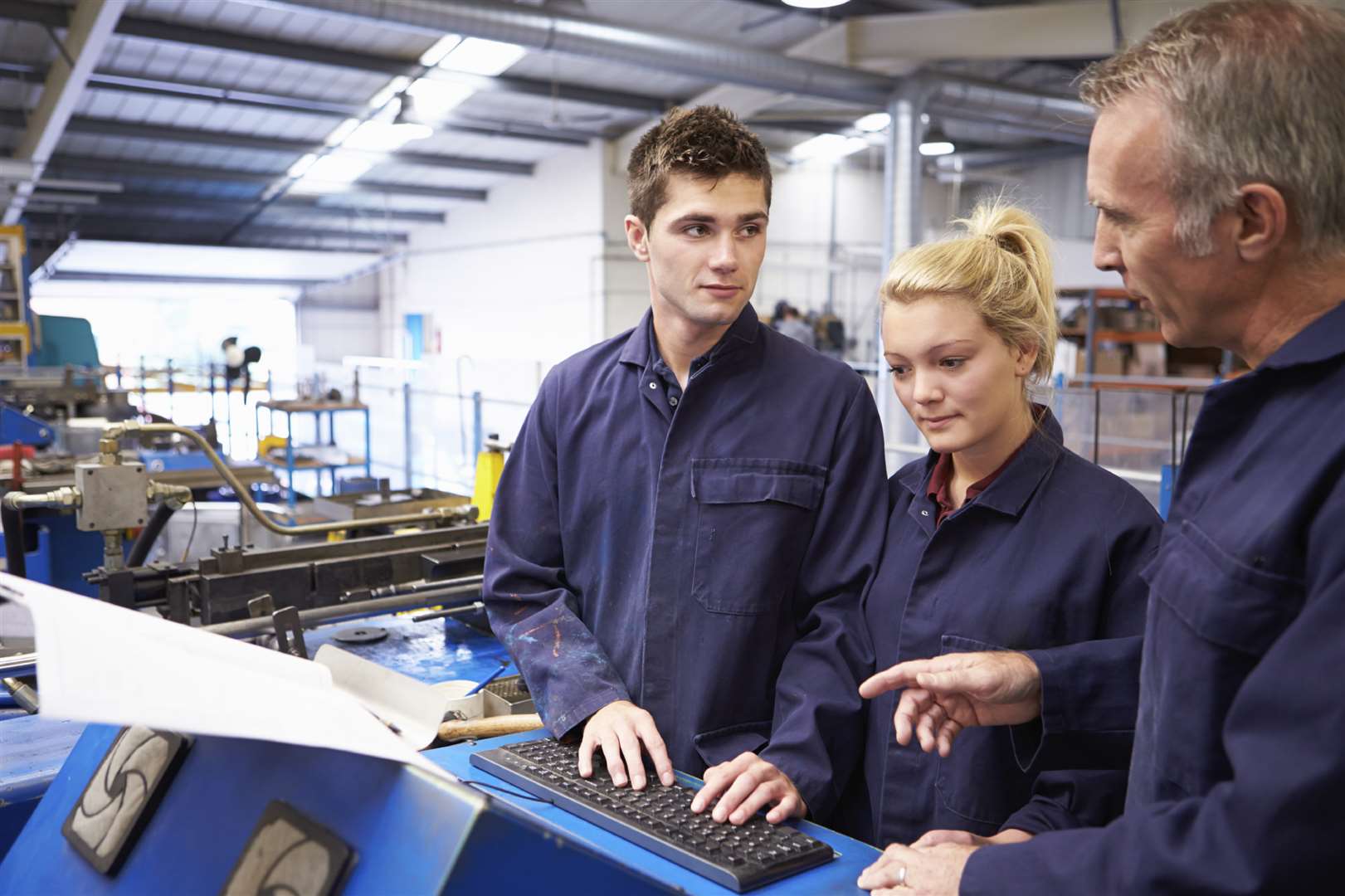 Engineer teaches apprentices