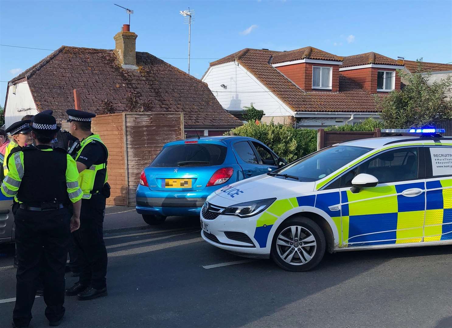 Police next to the Peugeot which crashed on Leysdown Road