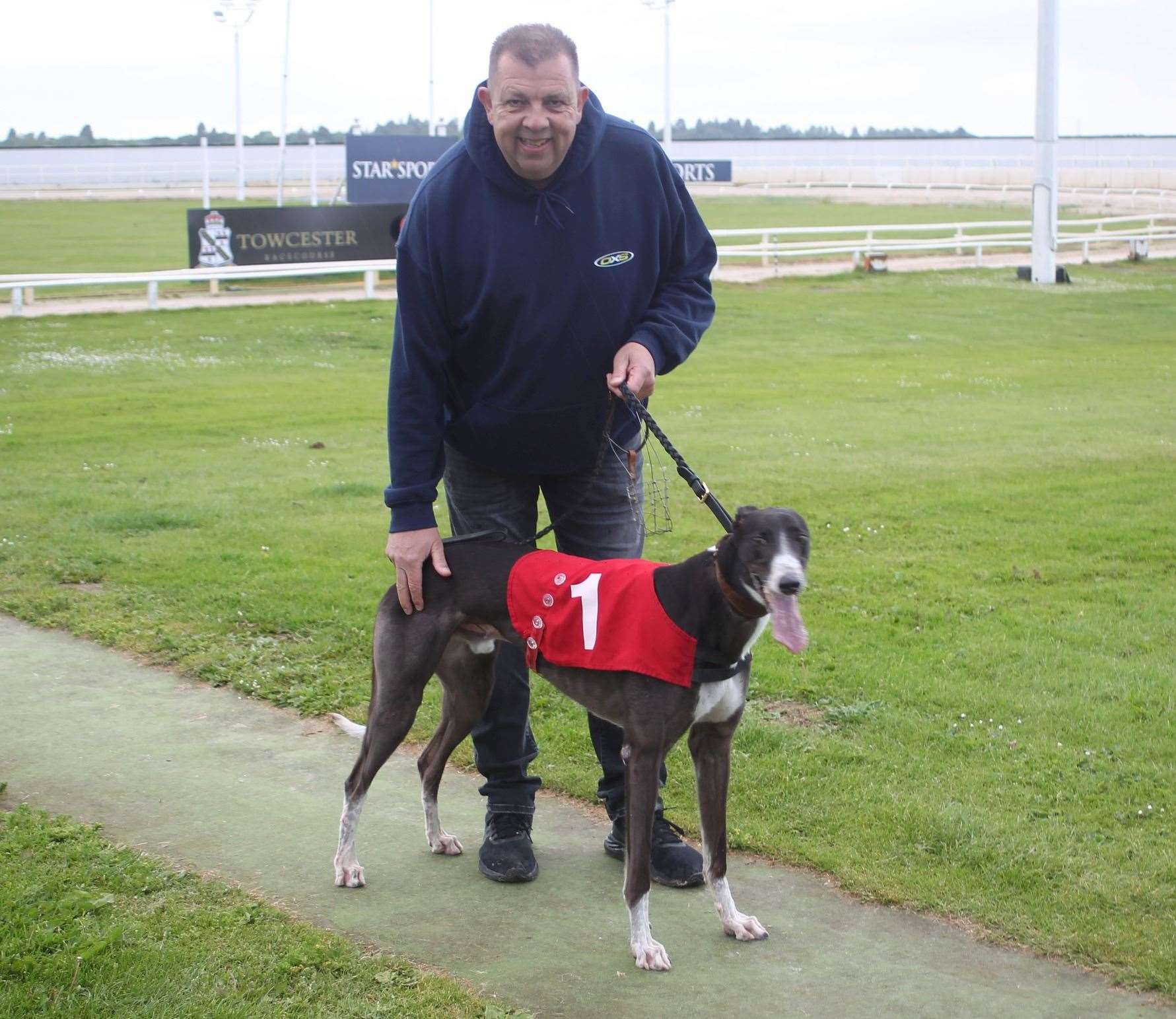 King Memphis, pictured with handler Wayne Mazey, is the favourite for Premier Greyhound Kent Derby glory. Picture: Jim Tate Photography