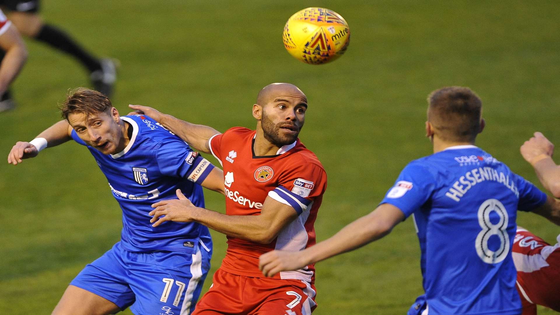 Lee Martin and Walsall's Adam Chambers get stuck in Picture: Ady Kerry