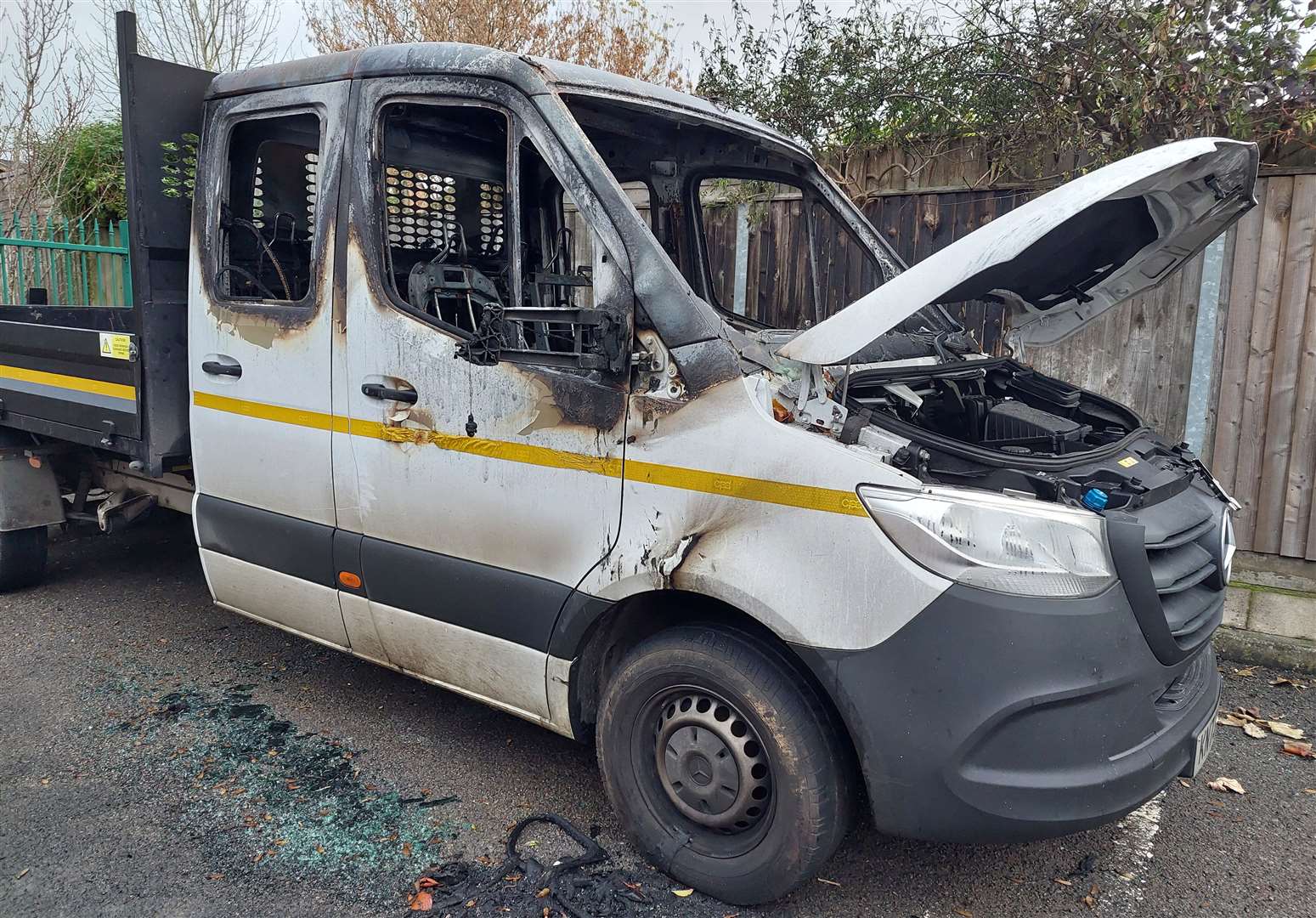 The burnt-out Mercedes Sprinter cab van was parked next to The Church of Jesus Christ of Latter-day Saints