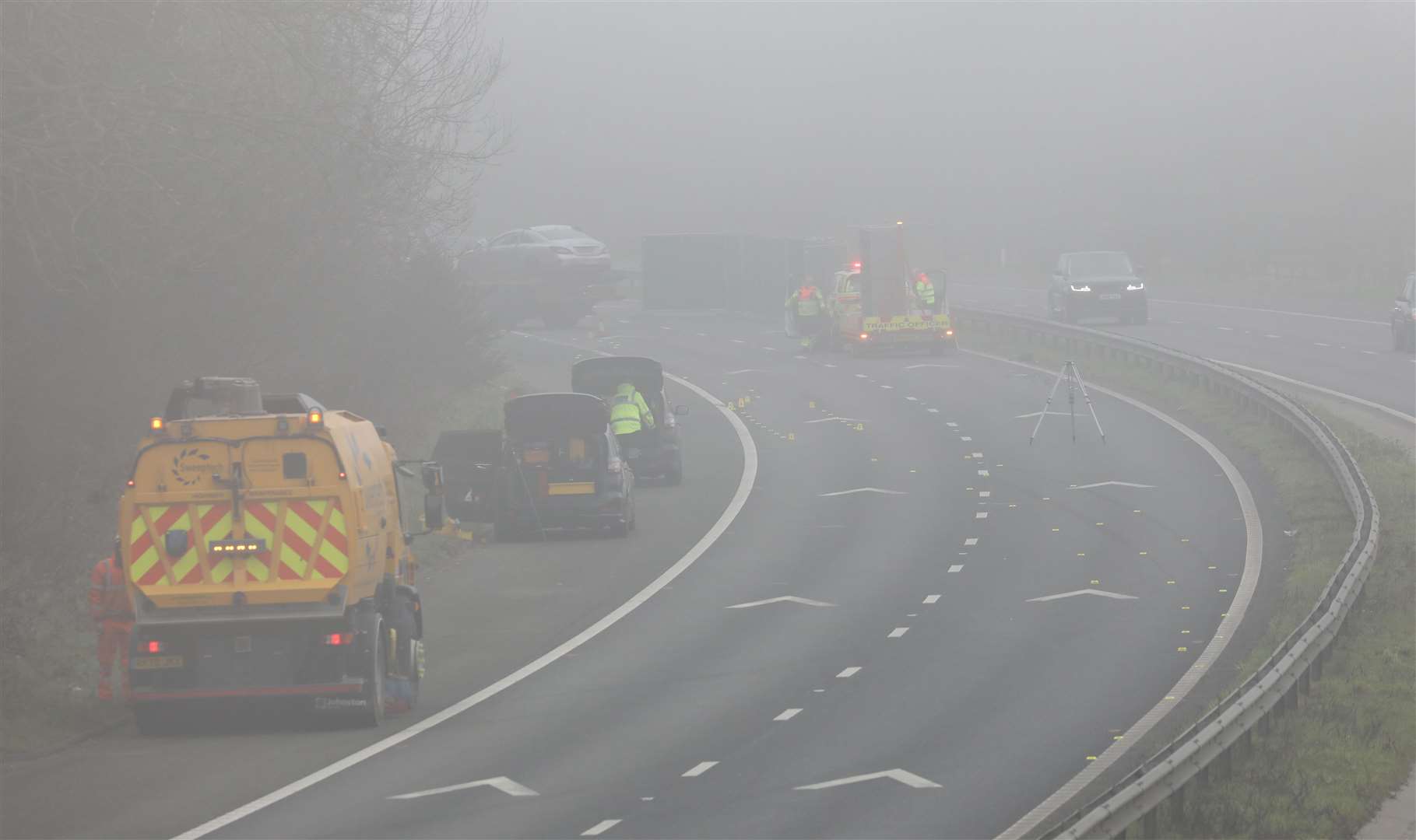 Crash investigators on the M2 this morning. Picture: UKNiP