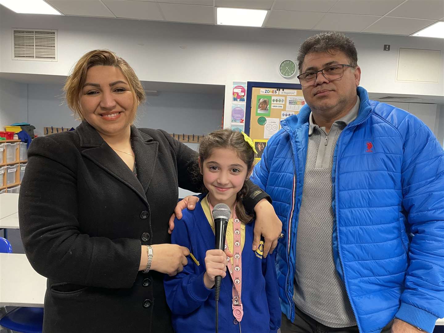 From left: Mum Mahanz Hajipour, Eliza Rajabalinia and dad Majid Rajabalinia are very proud