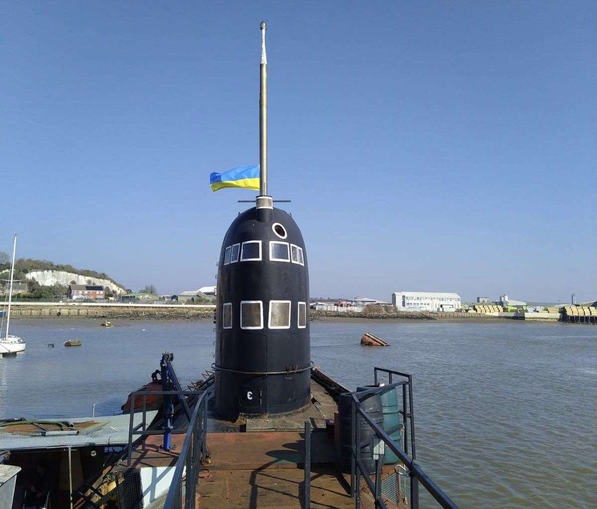 The Ukrainian flag is being displayed as a gesture of support