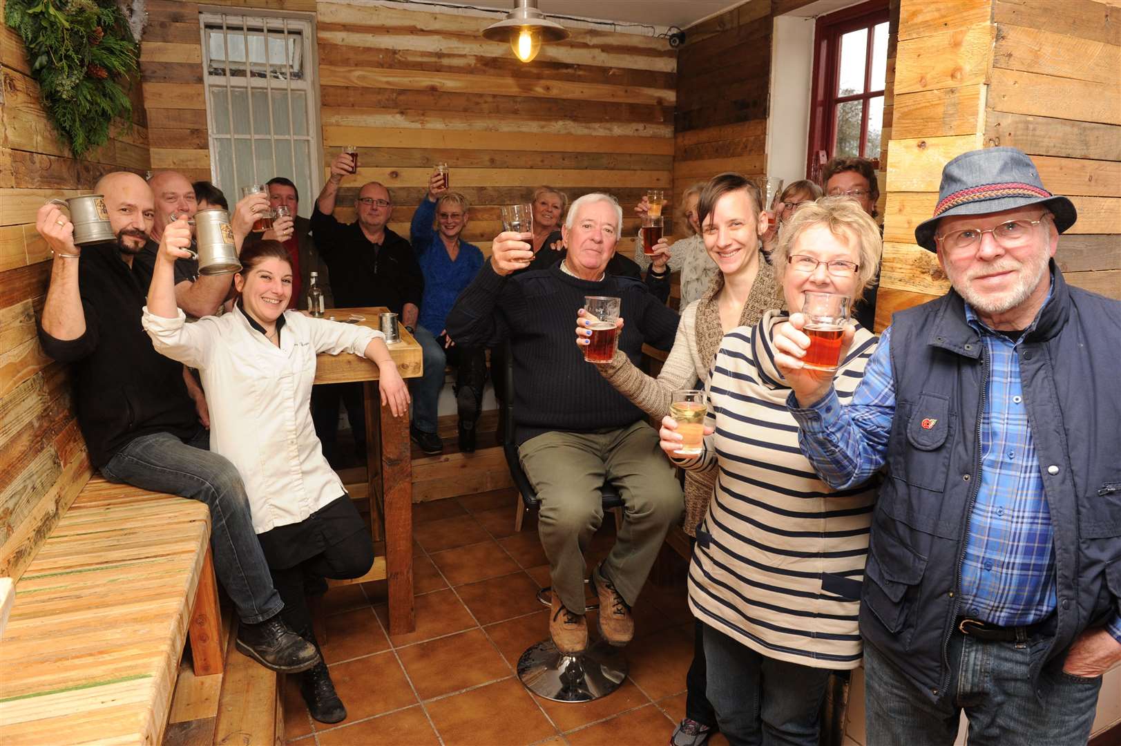 Melanie Royer and Cyril Cypres with drinkers. Picture: Steve Crispe