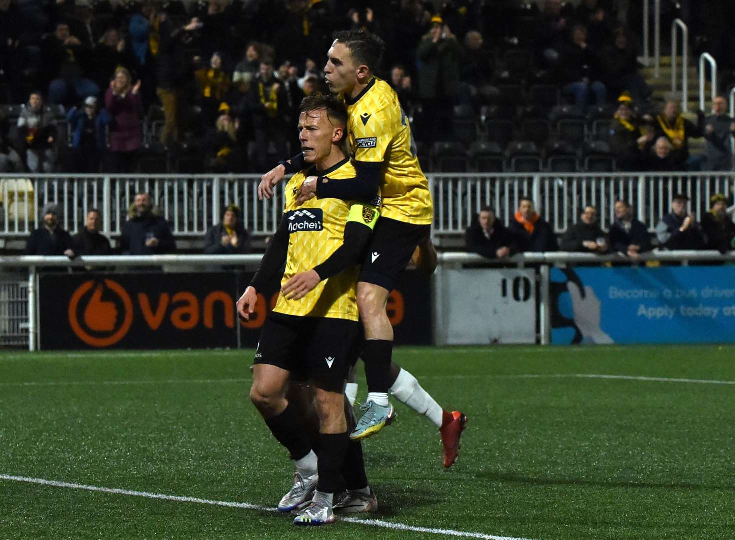 Sam Corne celebrates his penalty opener with Matt Rush. Picture Steve Terrell