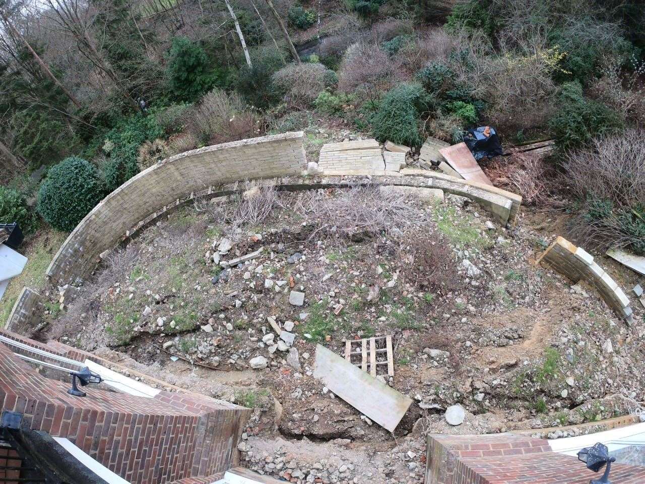 The wall which collapsed in the garden of Sandra and Stephen West's home in Benenden, near Tunbridge Wells. Picture: SWNS