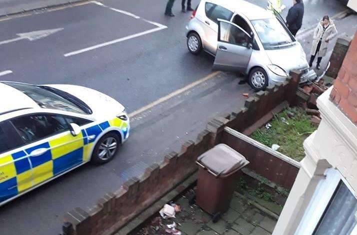 A collision, involving a silver and black car, caused damage to houses front garden walls. Picture: Lisa Marie Edwards (6247372)